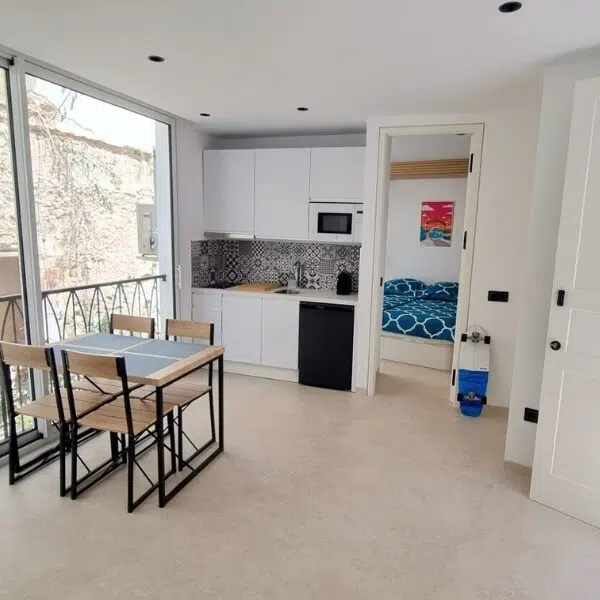 Open area kitchen / Living room with view on the city wall of the old town.