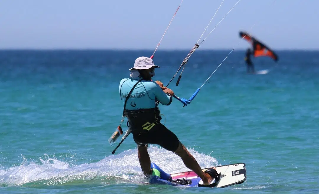 Independent kitesurfer riding upwind after completing their IKO Level 3 certification with Freeride Tarifa.