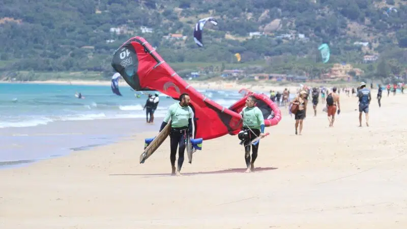 Wide sandy beach at Los Lances Norte, the official designated training zone for kite schools in Tarifa, featuring rescue boat services and safe conditions for beginners.